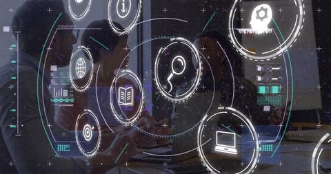 Design team collaborating over laptop with futuristic hud interface and glass reflections
