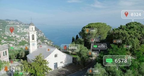 Coastal chapel with bell tower and ar overlays on mediterranean hillside panorama