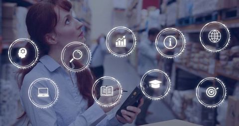 Warehouse Supervisor Analyzing Inventory with Logistic Symbols