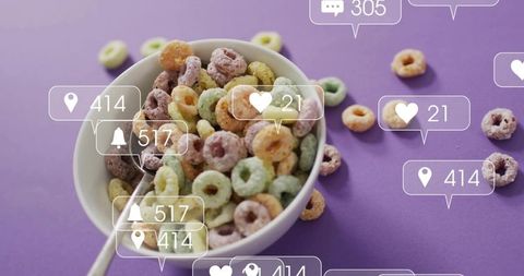 Colorful cereal bowl with social media notification overlays on purple backdrop for marketing