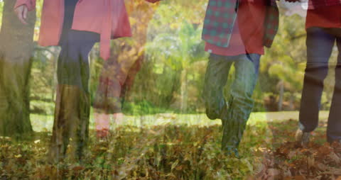 Family Strolling Through Autumn Park with American Flag Overlay
