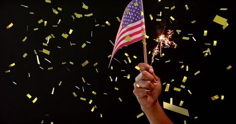 Hand Holding USA Flag and Sparkler Amid Golden Confetti - Download Free Stock Images Pikwizard.com