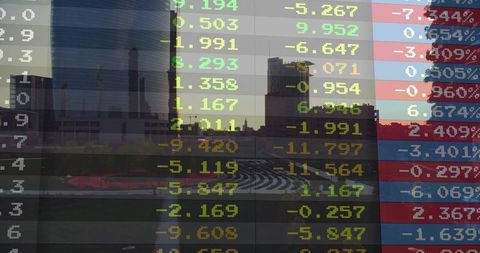 Stock market ticker overlaying urban skyline at dusk with circular plaza and glass tower