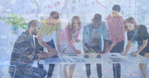 Diverse Team Collaborating with Virtual Data Dashboard