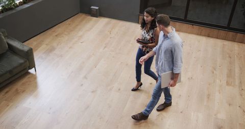 High Angle View of Colleagues Walking Through Office Foyer - Download Free Stock Images Pikwizard.com