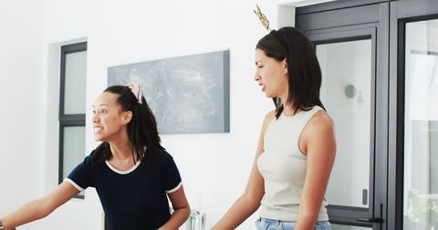 Diverse graduate friends celebrating achievement