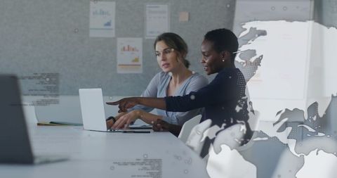 colleagues analyzing data with global overlay in modern office - Download Free Stock Images Pikwizard.com