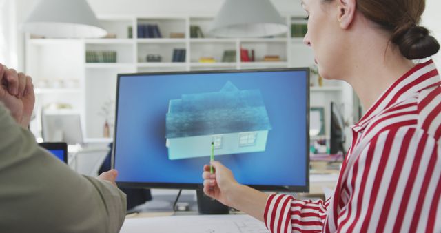 Architect Discussing 3D House Model on Computer Screen - Download Free Stock Photos Pikwizard.com