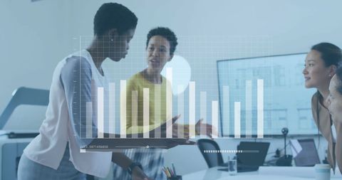 Diverse Team Collaborating on Business Data in Modern Office