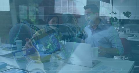 Colleagues Analyzing Financial Trends in a Modern Office Environment