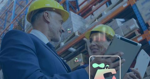 Reviewing tablet and collaborating in warehouse with augmented analytics and inventory