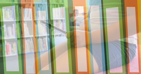 Child Engaged with Tablet in Library Inspirational Reading Education