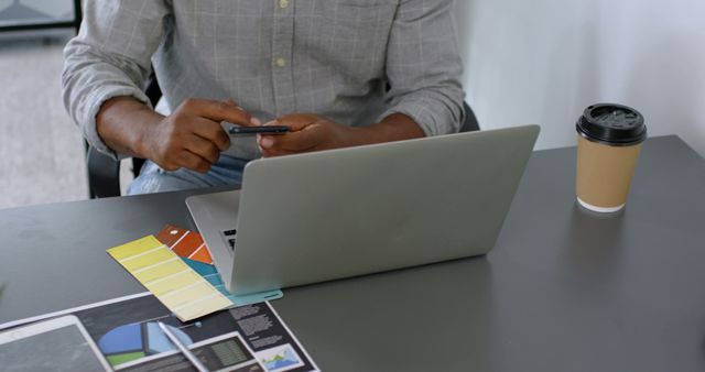 Person Using Smartphone at Desk with Laptop and Coffee - Download Free Stock Images Pikwizard.com