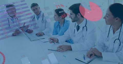 Medical team discussing healthcare data analytics in modern office