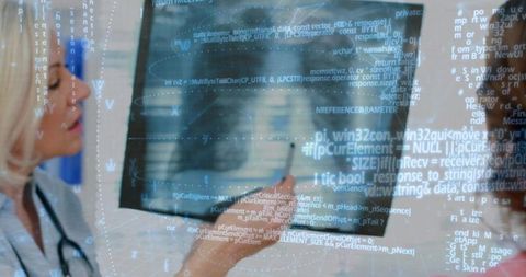 Clinician analyzing digital code in a healthcare environment