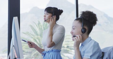 Professionals in headsets providing customer service