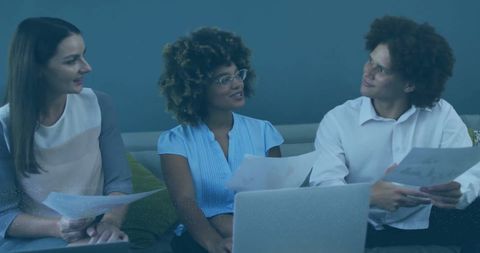 Diverse Business Team Collaborating with Financial Data