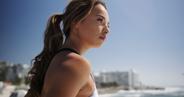 Young Woman Enjoying Outdoor Workout by the Seaside - Download Free Stock Images Pikwizard.com