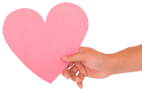 hand holding pink heart symbol on transparent background - Download Free Stock Videos Pikwizard.com