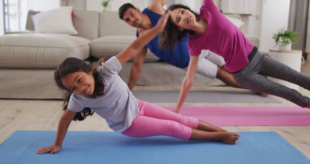 Family Enjoying Home Yoga Session Together - Download Free Stock Images Pikwizard.com