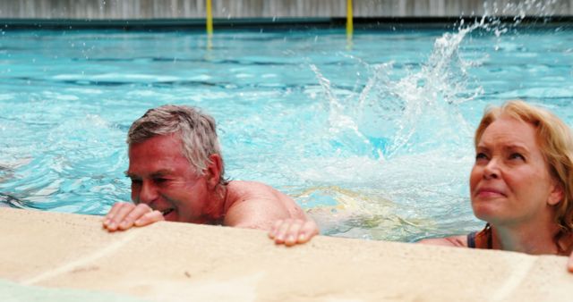 Senior Couple Relaxing and Swimming in Pool on Sunny Day - Download Free Stock Images Pikwizard.com