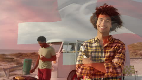 Smiling Friends Enjoying Beachfront Barbecue with Dutch Flag Overlay