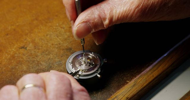 Watchmaker Repairing Intricate Mechanical Watch Part - Download Free Stock Images Pikwizard.com