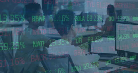 Diverse Team Analyzing Stock Market Data on Monitors