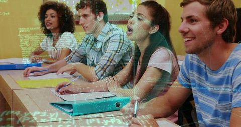 Diverse students taking notes in classroom with code overlay and teal binder for e-learning