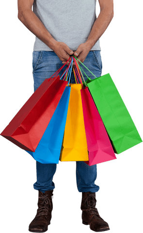 Transparent full shopping bags in hands of standing man