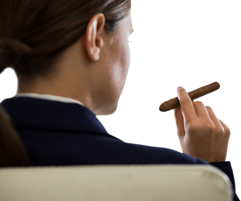Confident businesswoman holding cigar on transparent background