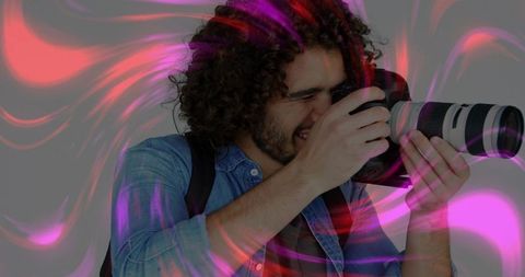 Photographer capturing creativity with telephoto dslr