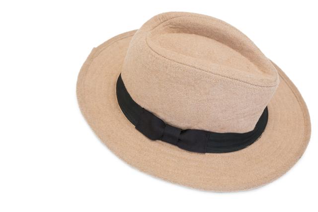 Close-up of beach hat on white background