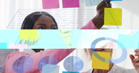 Diverse Business Team Brainstorming with Digital Graphs Cooking up Scores IMG_50279946