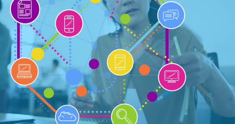 Illustrates modern technology intersections using vibrant digital icons overlaid on an office setting. Ideal for presentations about connectivity, technology integration, or interoffice communication. Highlights role of women in technology.