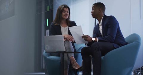 Colleagues Discussing Financial Data in Modern Office Space - Download Free Stock Images Pikwizard.com