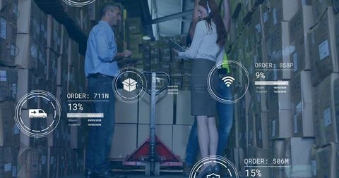Warehouse Staff Analyzing Digital Order Overlays with Tablet