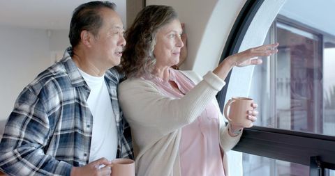 Senior Couple Enjoying Peaceful Day Indoors