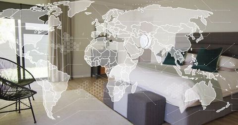 Global hospitality concept showing luxury king-size bed with teal pillows and map overlay