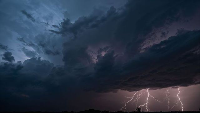 Dramatic lightning storm with dark shifting clouds