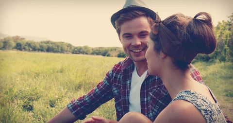Young Couple Enjoying Outdoor Day Together in Nature