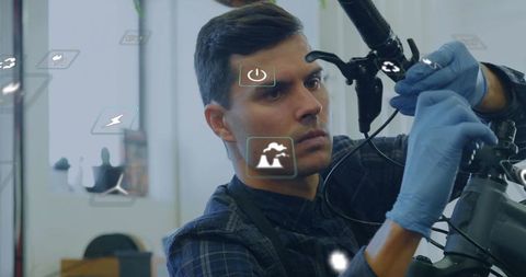 Technician adjusting bicycle handlebar with digital overlays