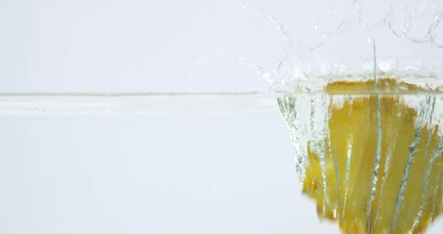 Fresh Pineapple Splashes into Clear Water - Download Free Stock Images Pikwizard.com