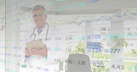 Senior Doctor Using Analytics to Enhance Healthcare Efficiency