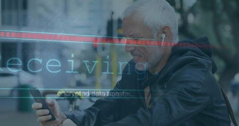 Senior man receiving encrypted code on smartphone outdoors