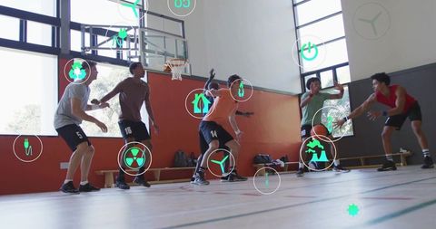 Basketball players dribbling and practicing defense with augmented reality overlays