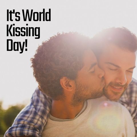 Couple celebrating world kissing day with sunlit gesture of love
