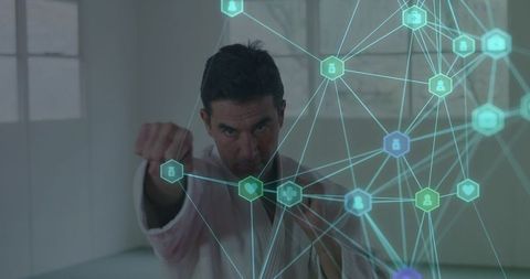 Karate practitioner punching with holographic network overlay, cyber self-defense concept