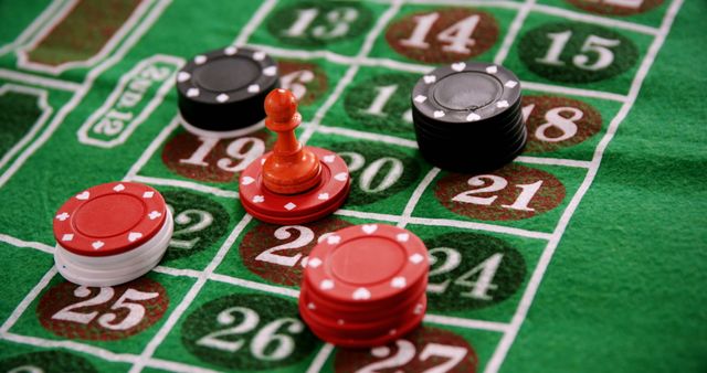 Casino chips on roulette on poker table in casino 