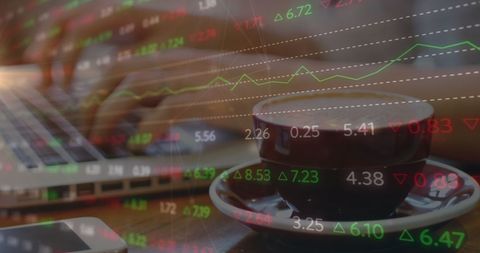 Financial analysis with laptop and stock market data